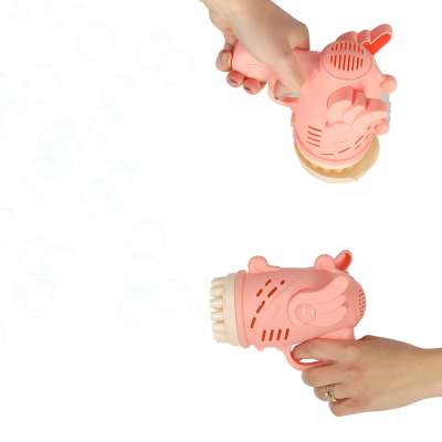 Soap bubble gun soap bubbles with wings pink