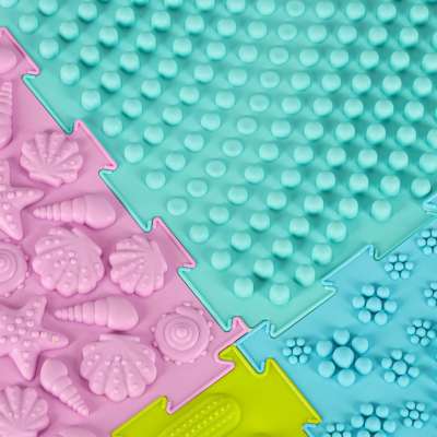 Mata sensoryczna puzzle montessori do masażu stóp 8 elementów pastelowe