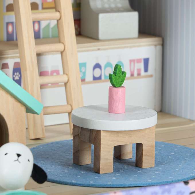 Pet hotel in a suitcase wooden furniture and figures