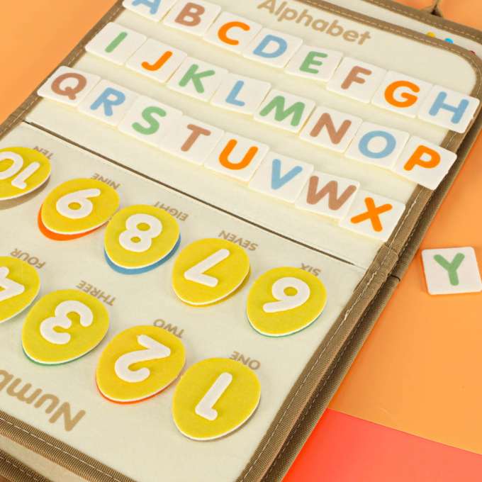 Tablica manipulacyjna sensoryczna montessori walizka dinozaury
